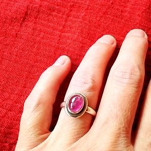 Sterling silver and purple stone ring.